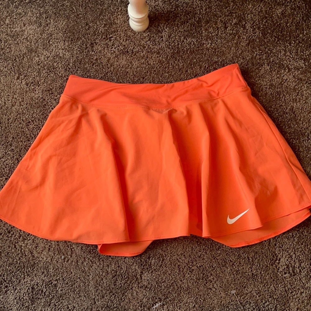 Pink/peach colored Nike dri fit skort size M